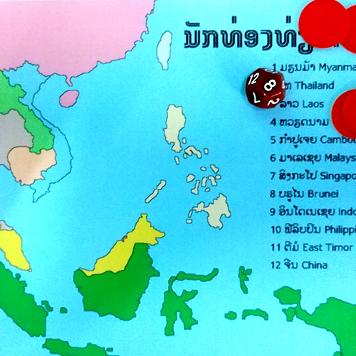 Lao students use a map as they play a game called World Traveler