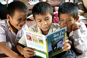 One or more books being read by children in Laos (picture will sometimes vary)