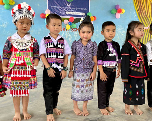 Small Lao children in the traditional attire of their ethnic group