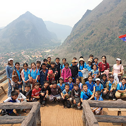 Students on a field trip from Ton Kit school in Nambak, Laos, at a mountain viewpoint