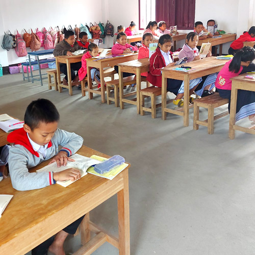 Children at Ton Kit school in Laos during a Sustained Silent Reading time.
